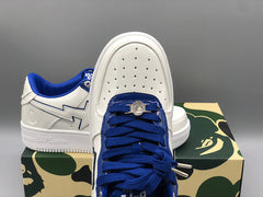 A BATHING APE Bape white & navy patent leather sneakers