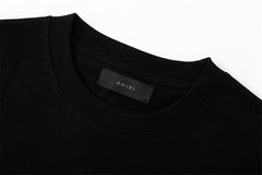 Embroidered letter T-shirt